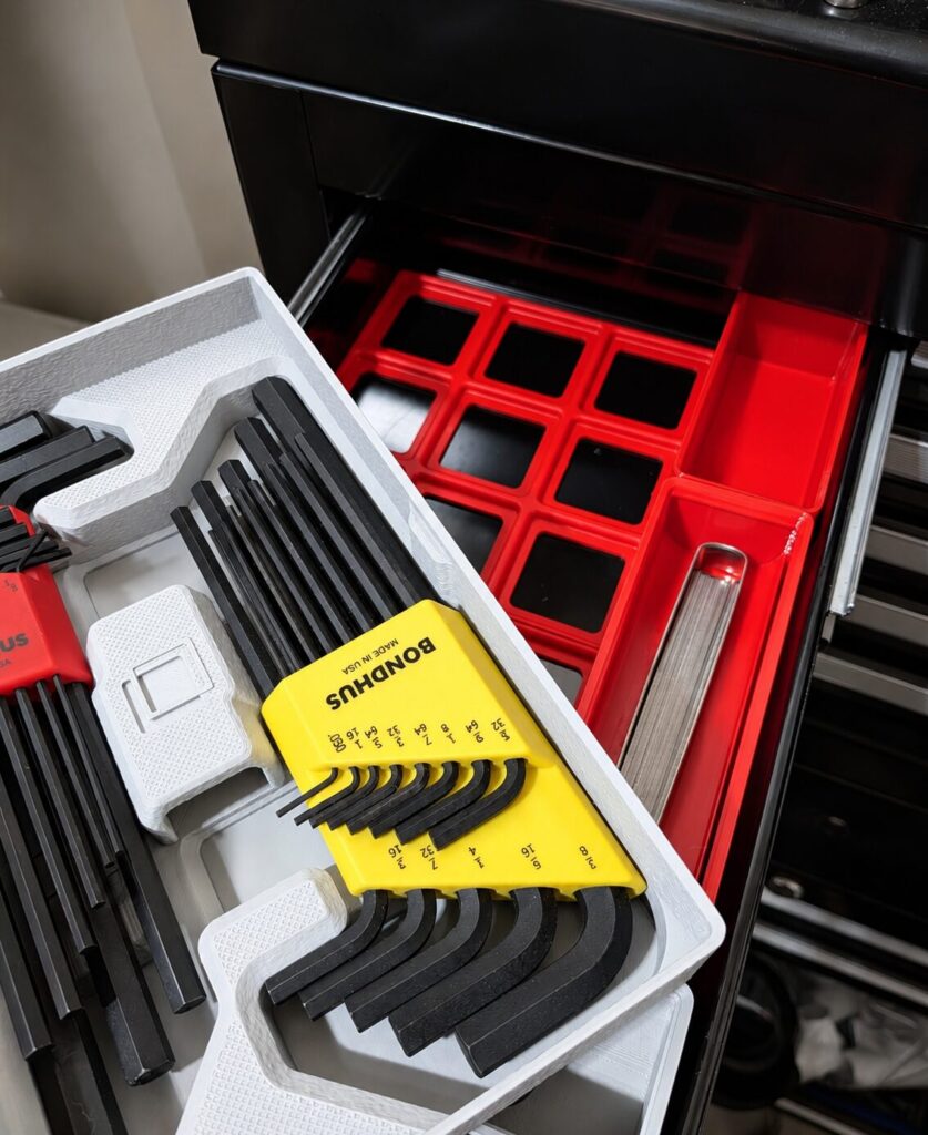 Benchforma allen wrench holder with Bondhus Hex Keys with a red Benchforma baseplate in the background.